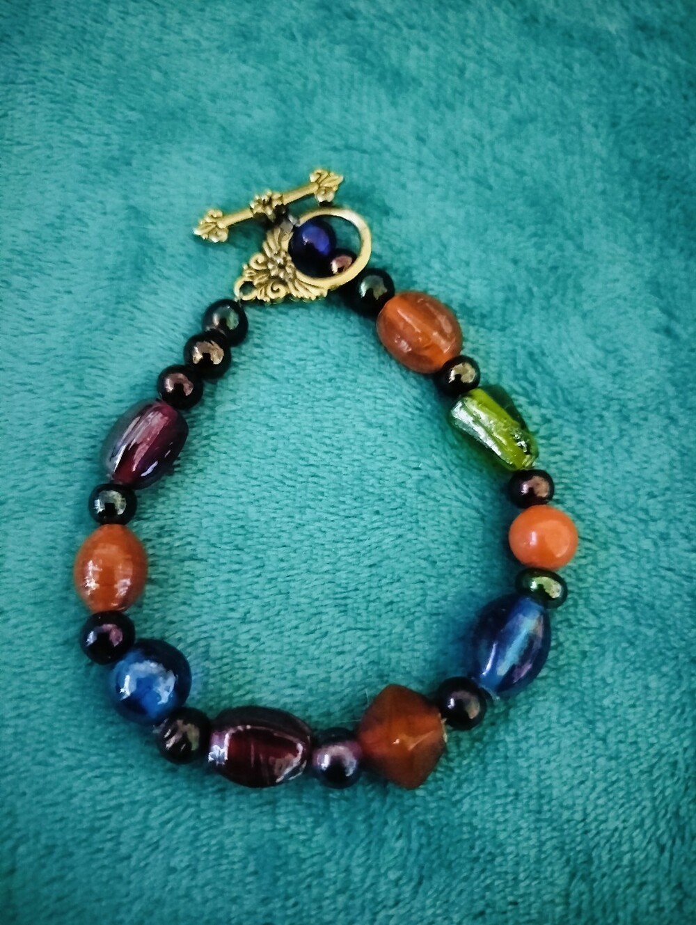 Multi-Color Glass & Beaded Toggle Bracelet | Ornate Gold Tone Clasp